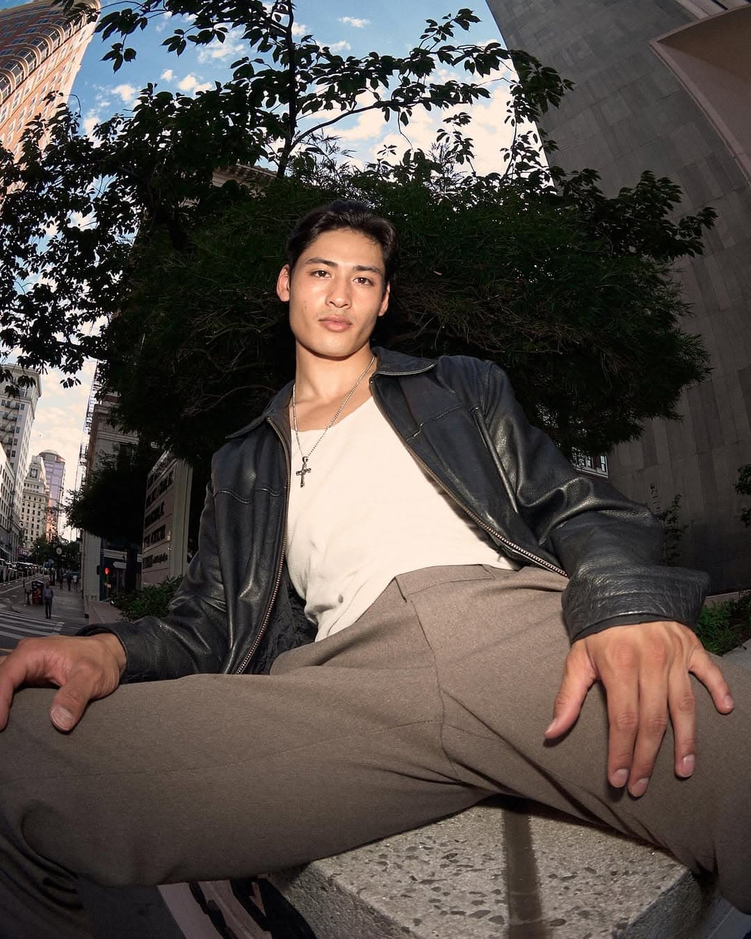 Christian Pumpelly street style with leather jacket in urban setting