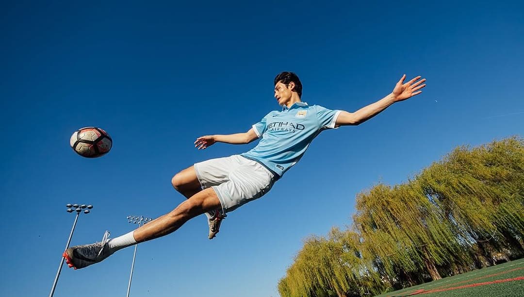 Christian Pumpelly dynamic soccer action shot - flying kick