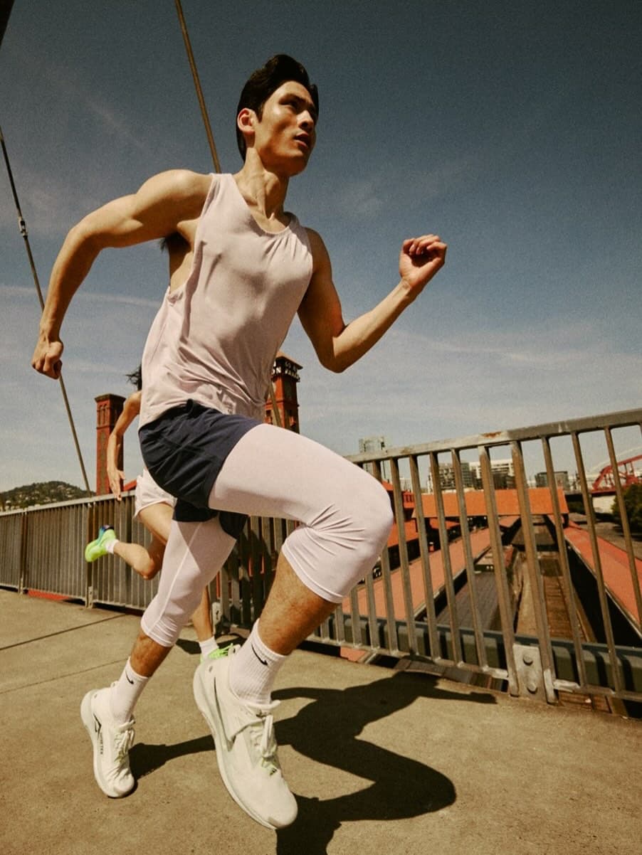 Christian Pumpelly athletic running shot on Portland bridge